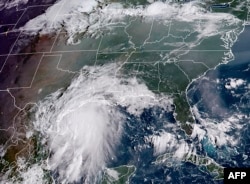 Gambar handout satelit RAMMB National Oceanic and Atmospheric Administration (NOAA) menunjukkan Badai Tropis Nicholas, di lepas pantai negara bagian Texas AS pada 13H40 UTC, 13 September 2021. (AFP)