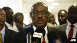 FILE - Sudanese Foreign Minister Al-Dierdiry Ahmed talks to the press in the Sudanese capital Khartoum, Aug. 28, 2018.