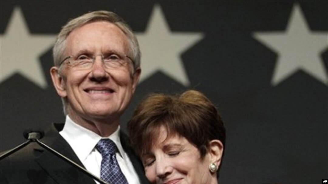 Sen. Harry Reid, D-Nev., embraces his wife Landra during the Nevada State Democratic election night party after defeating Sharron Angle to win re-election, 2 Nov. 2010, in Las Vegas.