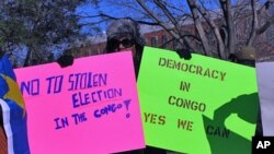 Protesters, like here at a recent rally outside the White House, have called for a new vote in the Democratic Republic of Congo.