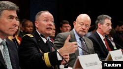 NSA Director General Keith Alexander (2nd L) testifies on Capitol Hill in Washington October 29, 2013. 