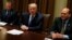 President Donald Trump meets with a bipartisan group of members of Congress, including Representative Josh Gottheimer, D-N.J., at left, and Representative Tom Reed, R-N.Y., at the White House in Washington, Sept. 13, 2017. 