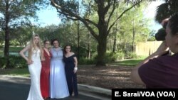 Parkland prom participants pose for a photograph.