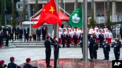 资料照片：澳门举行升旗仪式，纪念澳门主权交还中国22周年（2021年12月20日）