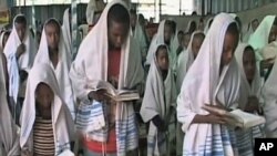 Recent immigrants from Ethiopia to Israel are studying Hebrew in the early morning at the Beit Canada Absorption Center - one of 16 in the country that are new arrivals' first home - in Ashkelon, Israel, November 2011.