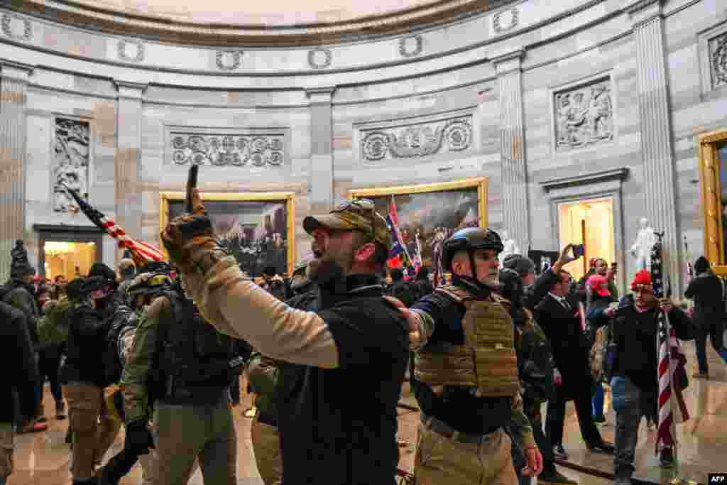 Supporters of US President Donald Trump enter the US Capitol&#39;s Rotunda