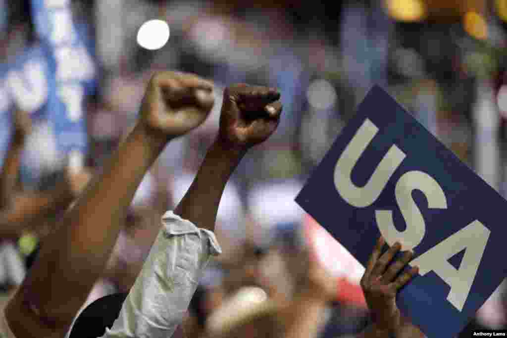 Delegates raise their fists during the final day of the Democratic National Convention in Philadelphia, July 28, 2016. 