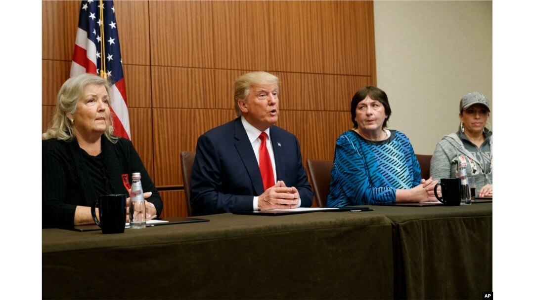Republican presidential candidate Donald Trump, second from left, make remarks before the second presidential debate with Democratic presidential candidate Hillary Clinton, Oct. 9, 2016.