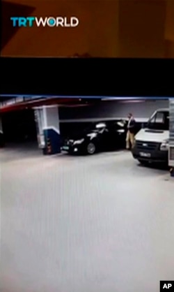 In this CCTV video made available from Turkish TRT TV, Oct. 22, 2018, showing a man getting out of a vehicle seemingly with Saudi consulate plates, at an underground car park in Istanbul.
