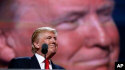 Republican presidential candidate Donald Trump speaks during the final day of the Republican National Convention in Cleveland, Ohio, July 21, 2016. (AP Photo/Carolyn Kaster)