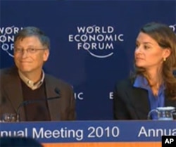 Bill and Melinda Gates unveil a $10 billion vaccine initiative at the World Economic Forum in Davos, Switzerland, 29 January 2010