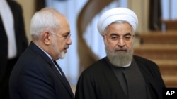 ایران کے صدر حسن روحانی اور وزیر خارجہ جواد ظریف (فائل فوٹو)