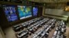 Photo of International Space Station (ISS) crew members Serena Aunon-Chancellor of the U.S., Alexander Gerst of Germany and Sergey Prokopyev of Russia is seen in the Russian Mission Control Center before a news conference on the results of the investigation on the failed Soyuz rocket launch on Oct. 11, in Korolev, outside Moscow, Russia, Nov. 1, 2018. 