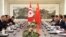 China's Foreign Minister Wang Yi, second from right, speaks as Tunisia's Foreign Minister Khemaies Jhinaoui, second from left, listens during a meeting at the Ministry of Foreign Affairs in Beijing, July 19, 2017.