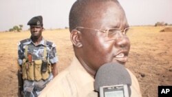 Guit County Commissioner of Unity State in South Sudan, James Puoy Yaka, talks to the press in Thaon village, April 12, 2012.