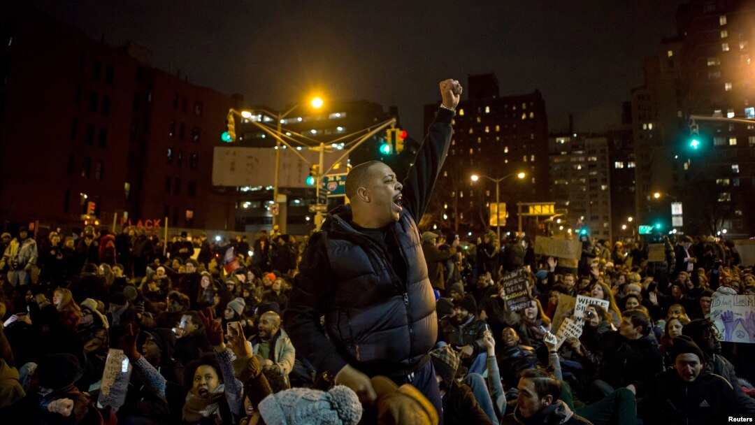Protesters gather in Manhattan as thousands take to the streets of New York demanding justice for the death of Eric Garner, Dec. 5, 2014.