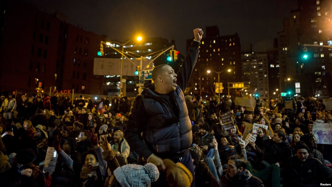 Protesters gather in Manhattan as thousands take to the streets of New York demanding justice for the death of Eric Garner, Dec. 5, 2014.