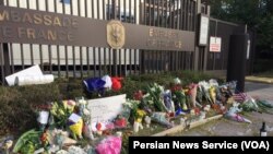 Homenaje a las víctimas de los ataques de París, afuera de la Embajada de Francia en Washington DC. Noviembre 14, 2015.