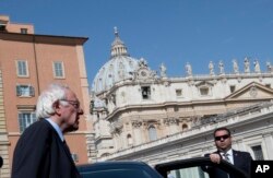 US presidential candidate Bernie Sanders, backdropped by the dome of St. Peter's Basilica, leaves after an interview with the Associated Press, at the Vatican, April 16, 2016.