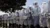 Greek Police Clash with Migrants Blocked at Macedonia Border