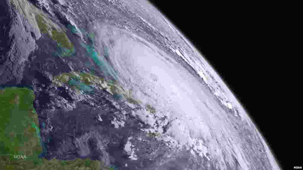 Major Hurricane Joaquin is shown at the far eastern periphery of the GOES West satellite&#39;s full disk extent.