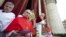 Pope Benedict XVI (2nd R) gestures before his "Urbi et Orbi" (To the city and the world) address from a balcony in St. Peter's Square in Vatican December 25, 2012. 