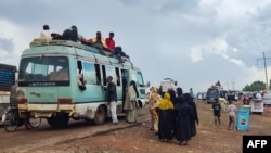 People displaced from eastern areas of Sudan's al-Jazira state arrive to Gedaref city on Oct. 27, 2024.