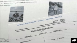 (FILE) The criminal complaint, filed by the Justice Department, against Nasir Ahmad Tawhedi of Oklahoma City is photographed Tuesday, Oct. 8, 2024.