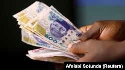 Les billets de banque naira nigérians sont vus dans cette photo d'illustration, le 10 septembre 2018. Photo prise le 10 septembre 2018. REUTERS/Afolabi Sotunde/Illustration/File Photo
