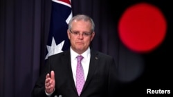 Prime Minister Scott Morrison speaks to the media during a press conference at Parliament House in Canberra, Australia, Oct. 16, 2018. 