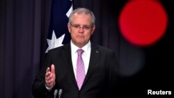 Prime Minister Scott Morrison speaks to the media during a press conference at Parliament House in Canberra, Australia, Oct. 16, 2018. 