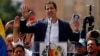 Juan Guaido, head of Venezuela's opposition-run congress, declares himself interim president of Venezuela, during a rally demanding President Nicolas Maduro's resignation in Caracas, Venezuela, Jan. 23, 2019.