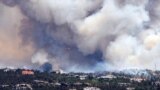 Smoke billows from a wildfire burning near Colorado Springs, Colorado, June 24, 2012.
