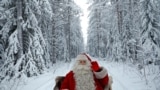 Santa Claus rides in his sleigh as he prepares for Christmas in the Arctic Circle near Rovaniemi, Finland, Dec. 15, 2016.