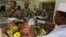 U.S. soldiers line up for food during a Thanksgiving meal in Kabul, Afghanistan, November 22, 2012.
