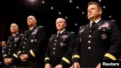 FILE - U.S. Army generals stand ready to testify about pending legislation regarding sexual assaults in the military at a Senate Armed Services Committee on Capitol Hill in Washington, June 4, 2013. 