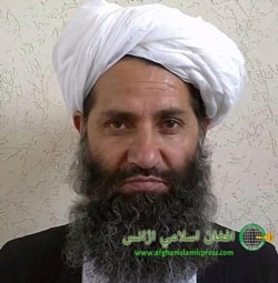 FILE - In this undated photo taken at an unknown location, the leader of the Taliban, Mullah Haibatullah Akhundzada, poses for a portrait.