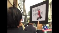 香港记者等人游行抗议记者在北京挨打