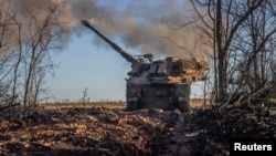 Ukrainian servicemen fire a Polish self-propelled howitzer Krab toward Russian positions, amid Russia's attack on Ukraine, on a frontline in Donetsk region, Ukraine Nov. 8, 2022. 