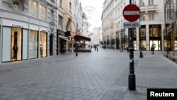 A nearly empty shopping district is seen after the Austrian government imposed a new national COVID-19 lockdown, in Vienna, Austria, Nov. 22, 2021. 