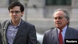 Former drug company executive Martin Shkreli, left, and his lead attorney Benjamin Brafman arrive at U.S. District Court in New York, Aug. 2, 2017. Brafman is defending Reza Zarrab, who is facing criminal charges of helping Iran evade U.S. sanctions betwe