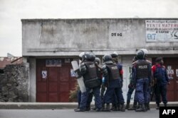 Kivu-Norte, Polícia afasta manifestantes durante a campanha eleitoral