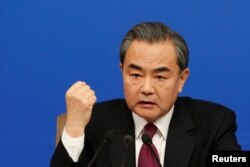 Chinese Foreign Minister Wang Yi attends an news conference at the annual session of the National People's Congress (NPC), in Beijing, China, March 8, 2017.