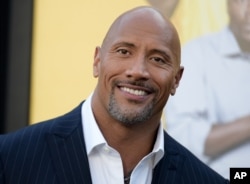 FILE - Actor Dwayne Johnson attends the premiere of his film "Central Intelligence" in Los Angeles, June 10, 2016.