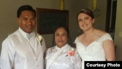 Chheng Soeun, also known as Chheng Posy, and his mother, center, and wife on their wedding day. (Courtesy Photo of RELEASE MN 8)