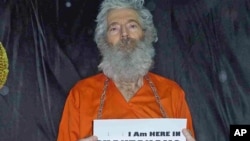 Undated handout photo shows retired FBI agent Robert Levinson. His family received these photographs in April 2011.