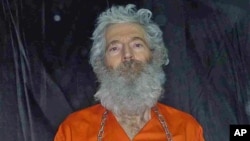 Undated handout photo shows retired FBI agent Robert Levinson. His family received these photographs in April 2011. 