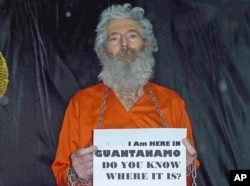 Undated handout photo shows retired FBI agent Robert Levinson. His family received these photographs in April 2011.