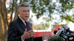 Republican Mark Harris speaks to the media during a news conference in Matthews, N.C., Nov. 7, 2018.