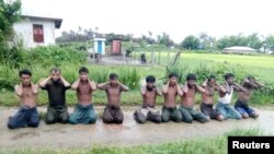 (1/1)Reuters Investigates: Massacre in Myanmar မြန်မာနိုင်ငံမှ အစုလိုက်အပြုံလိုက်သတ်ဖြတ်မှုဆိုတဲ့ ခေါင်းစဉ်နဲ့ အစီရင်ခံစာ ရိုက်တာသတင်းဌာနက ဖေဖော်ဝါရီလ ၈ ရက်နေ့စွဲနဲ့ ထုတ်ပြန်။